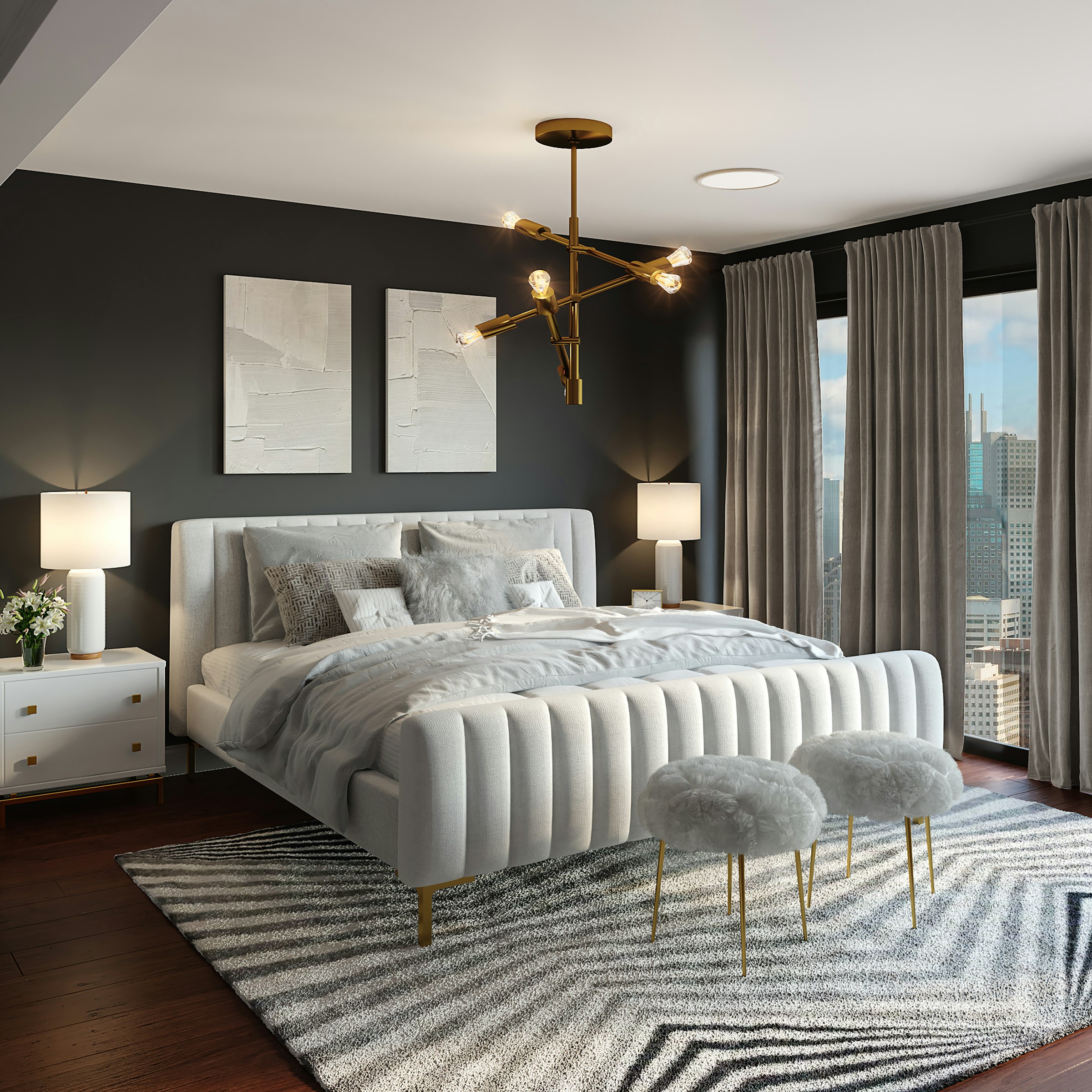 Luxury bedroom with charcoal walls and a brass chandelier